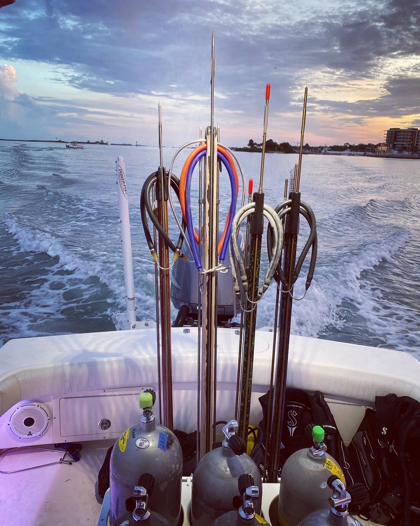 6-pack dive tank holder in cockpit of a center console boat